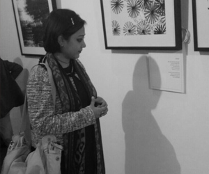 At a photo - poetry collection launch and exhibition in Delhi